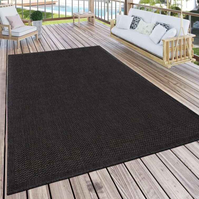 Black store outdoor rug